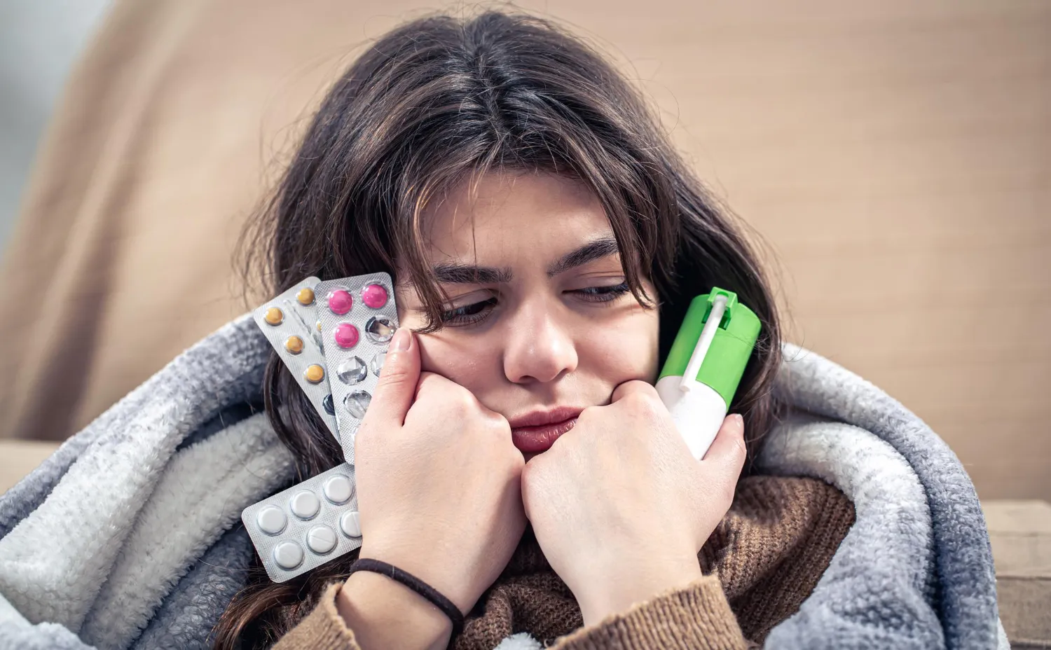 Woman comparing generic drugs and prescription medications while managing treatment at home