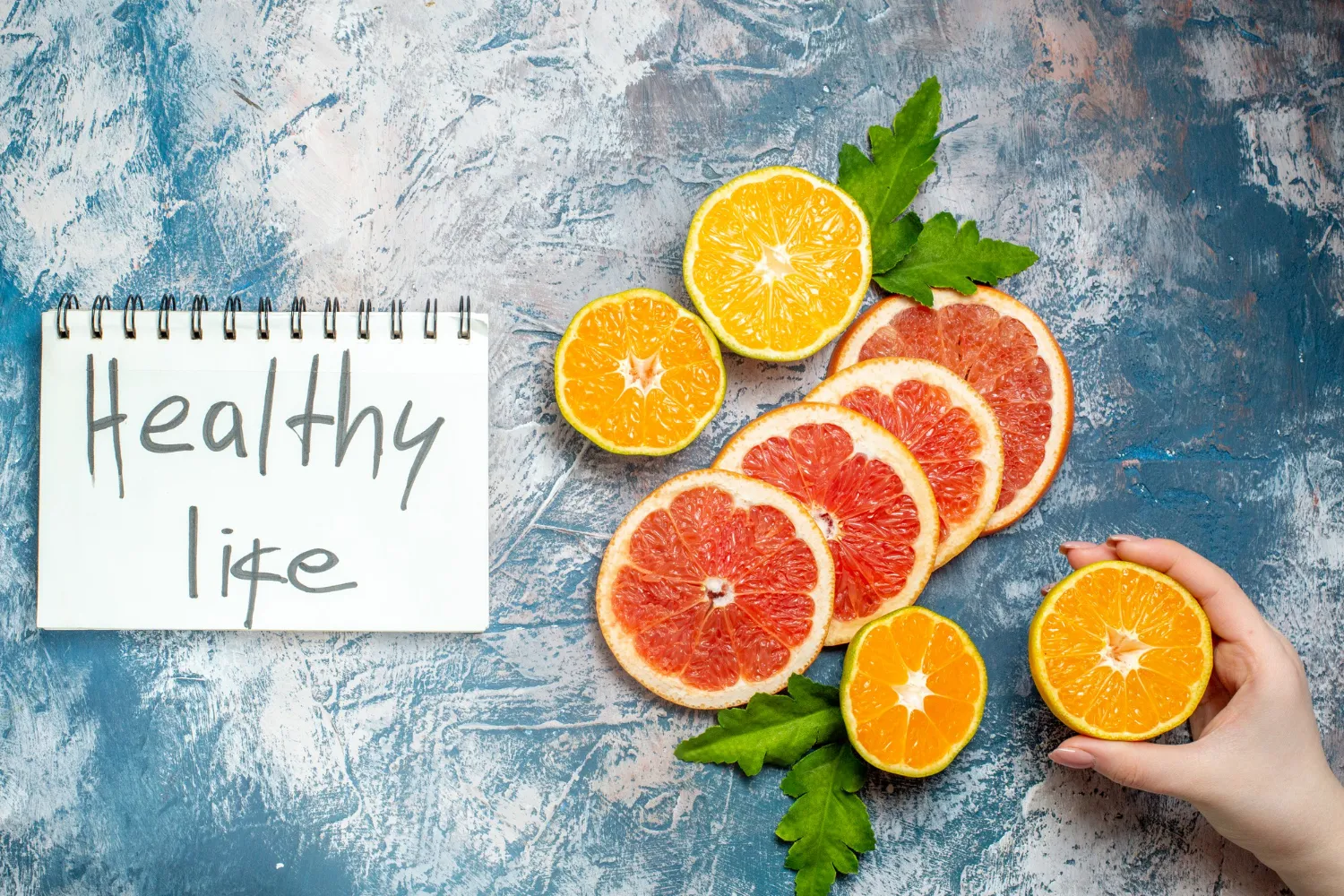 Fresh citrus fruits with a “Healthy life” note, symbolizing natural sources of nutrients and the importance of visiting a vitamin & supplements store for high-quality health supplements vitamins and daily wellness support