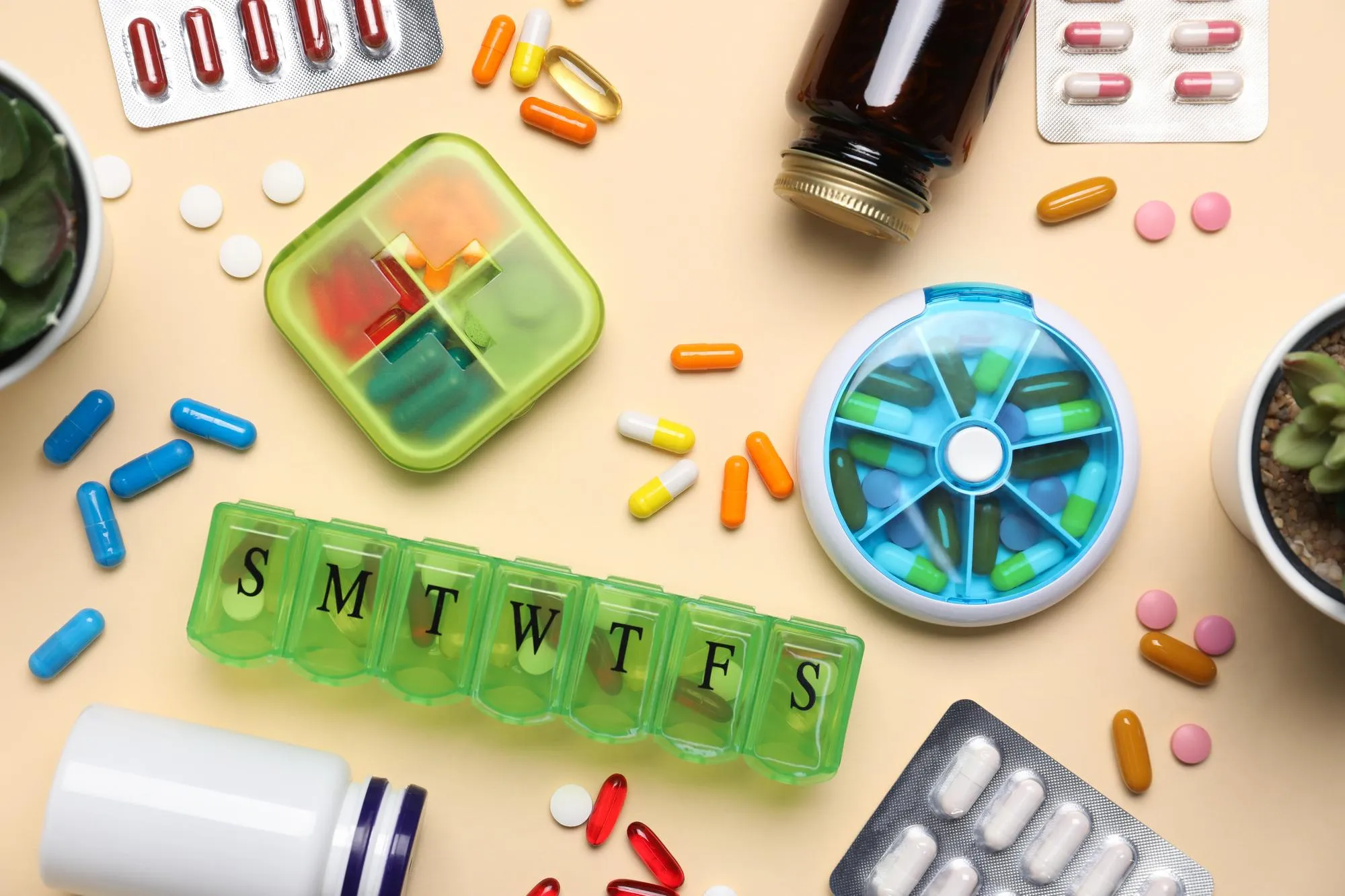 Various blister pack medications and pill organizers arranged, showcasing pharmacy blister packs and personalized pill packaging solutions