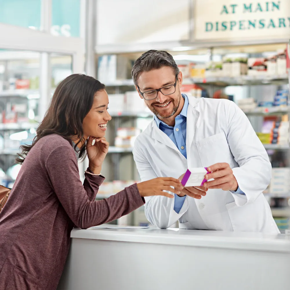 Pharmacist reviewing medication inventory as part of pharmacy services in Jacksonville.